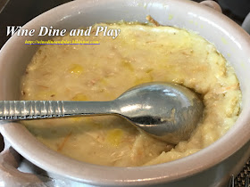 Harees (har-rees) an Abu Dhabi homemade wheat and fresh shredded veal, blended to perfection and served soufflé style mixed with ghee.