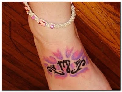 The sixth of my Star Sign Tattoo Designs is this beautiful foot symbol Virgo