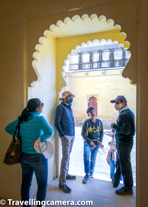 The security guard at Mardana Mahal was kind enough to share some interesting facts and stories about Mardana Mahal of Badal Mahal. Above photograph shows how much the group was focussed to hear him. Certainly he was a good story teller and knew enough about the space he was guarding for tourists at Kumbalgarh Fort in Rajasthan. Such people make your travel experiences even more beautiful.