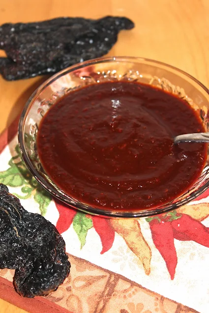 Bowl with the finished ancho chile and chipotle hot sauce for the Sofritas.