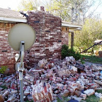 This home in Prague, Okla., was damaged from a magnitude 5.6 earthquake in 2011. Scientists have concluded it was likely caused by the injection of wastewater from oil and gas wells. (Credit: Brian Sherrod, USGS) Click to Enlarge.