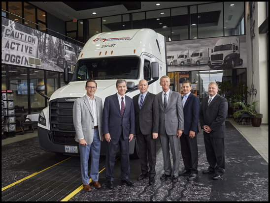 From left to right: DTNA Senior Vice President of Operations and Specialty Vehicles Jeff Allen, North Carolina Governor Roy Cooper, DTNA CEO Roger Nielsen, Freightliner Trucks Vice President of Sales Bob Correll, Cleveland Truck Manufacturing Plant Manager Erik Johnson and Chairman of Cargo Transporters John Pope Stand with the 50,000th Freightliner Cascadia