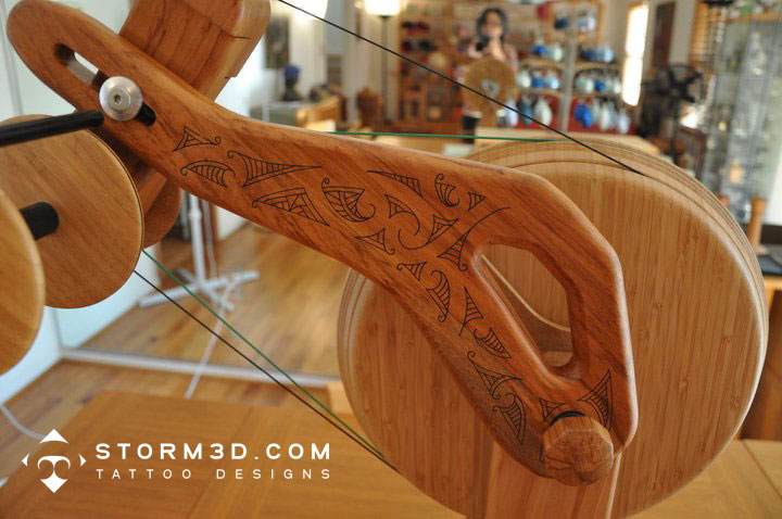 maori design on a spinning wheel