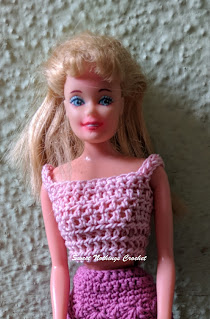 Barbie modelling her top and skirt