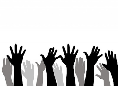 Image of Raising Hands as part of voting
