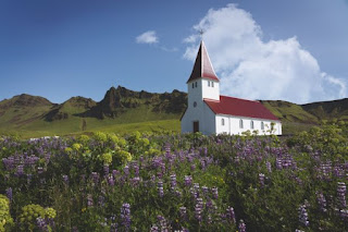 Church in field Photo by Sigurdur Fjalar Jonsson on Unsplash