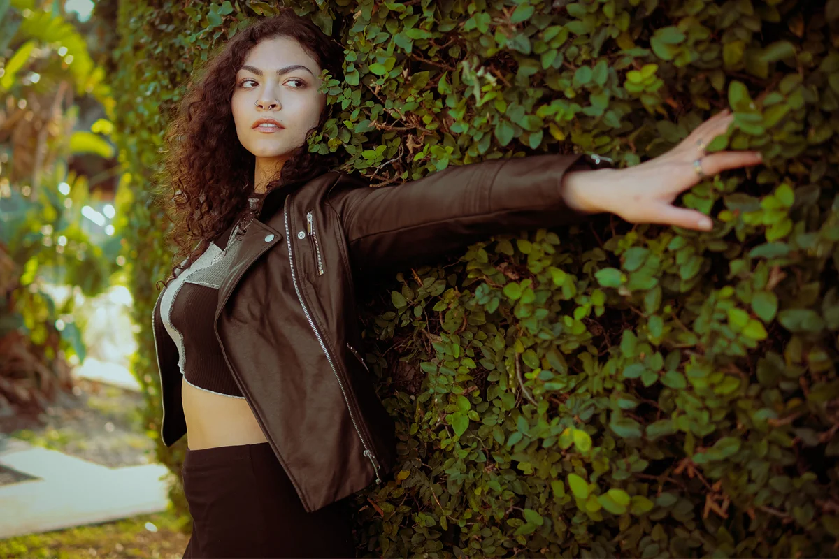 beautiful woman in a stylish total black outfit