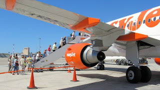 EasyJet plans to remove seats on some of its planes this summer, so that it can operate flights with fewer cabin crew