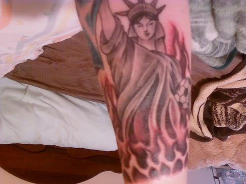 Statue of liberty forearm tattoo idea