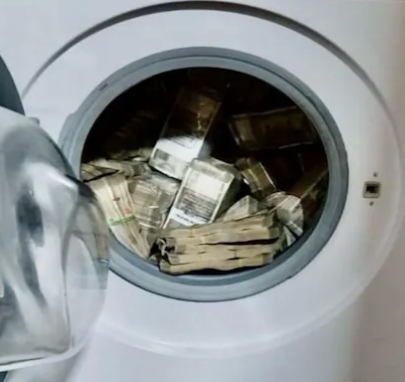  During searches, the ED finds crores of rupees hidden in a washing machine