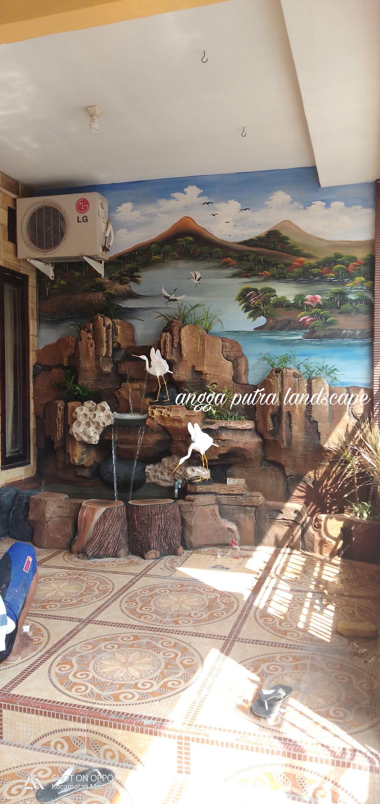 Jasa pembuatan dekorasi kolam tebing,dekorasi relief air terjun bojonegoro