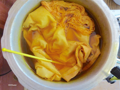 cotton dyed with turmeric,alkaline pH