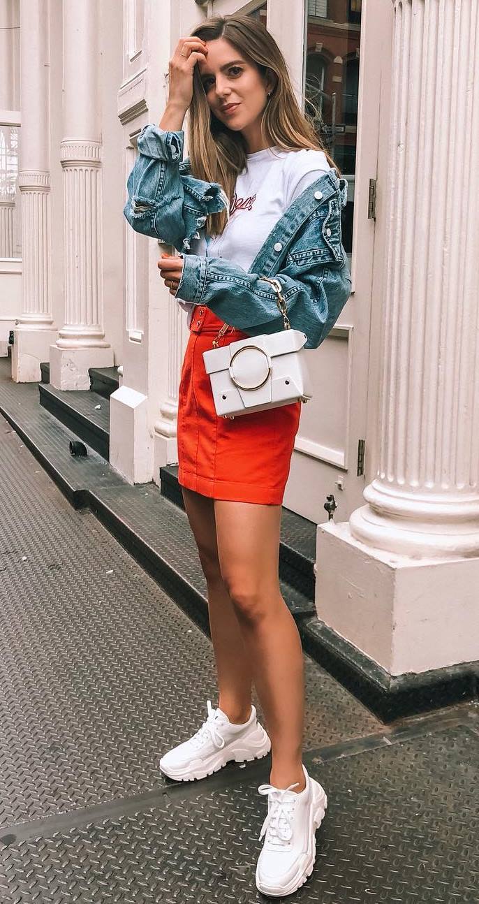 trendy outfit with a red skirt : white sneakers + bag + white top + denim jacket