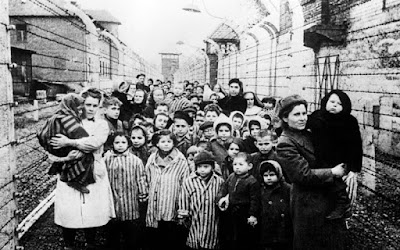 A kindergarten in Auschwitz, little prisoners in striped uniforms.