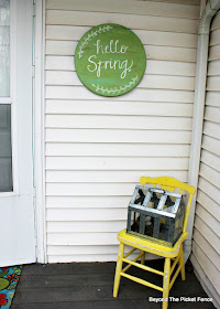 add spring decor to your porch a bit at a time