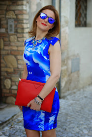 Red clutch, blackfive dress, Oakley blue mirror sunglasses, Fashion and Cookies, fashion blogger