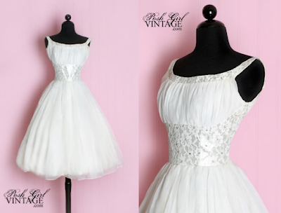 It's a 1950's White Tea Length Wedding Party Dress from Posh Girl Vintage
