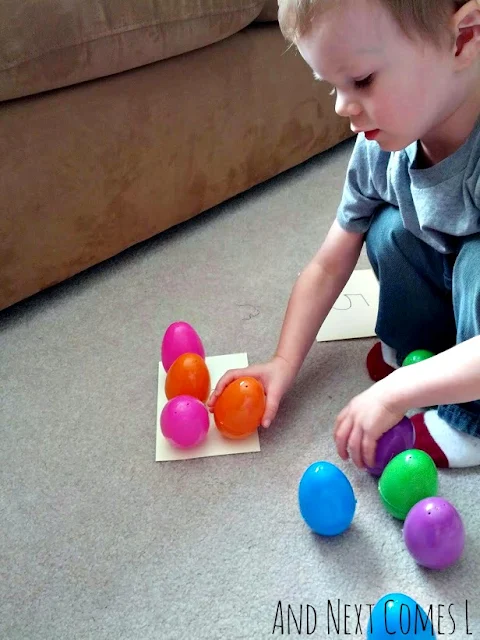 J adding with wobbly Easter eggs from And Next Comes L