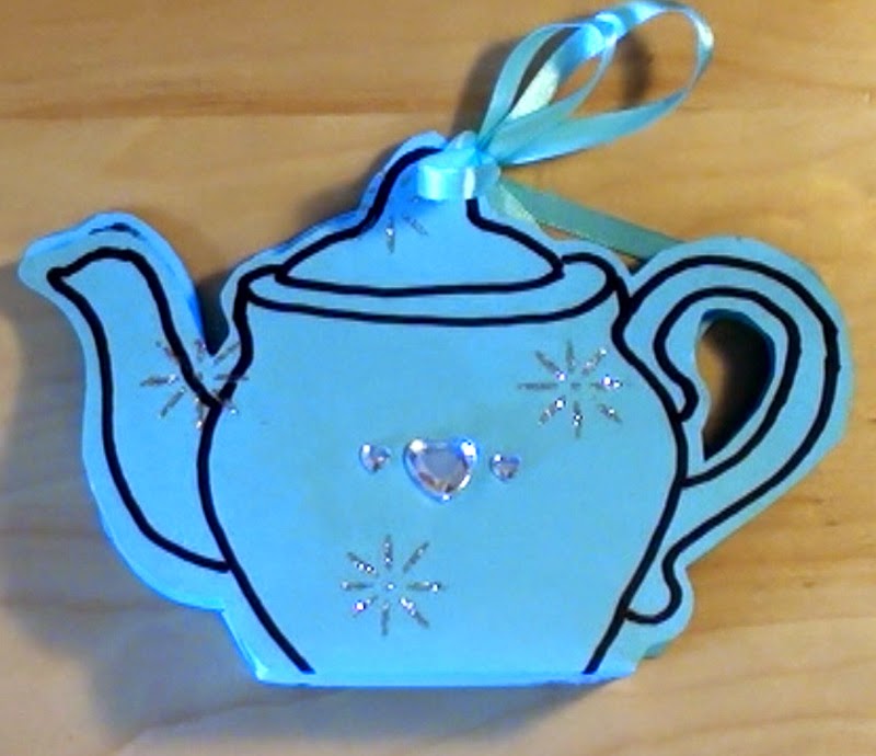 http://diy-card.blogspot.dk/2014/11/teapot-cards-with-tea-inside.html