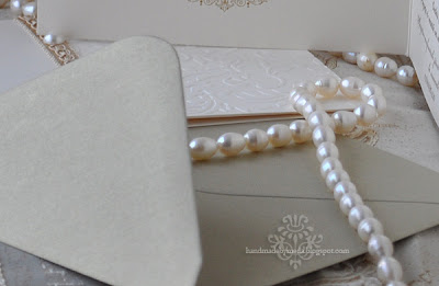 gold invitation with pearls -detail 