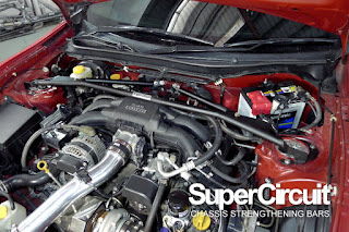 SUPERCIRCUIT Front Strut Bar with brake stopper is installed to the Toyota 86's engine bay.
