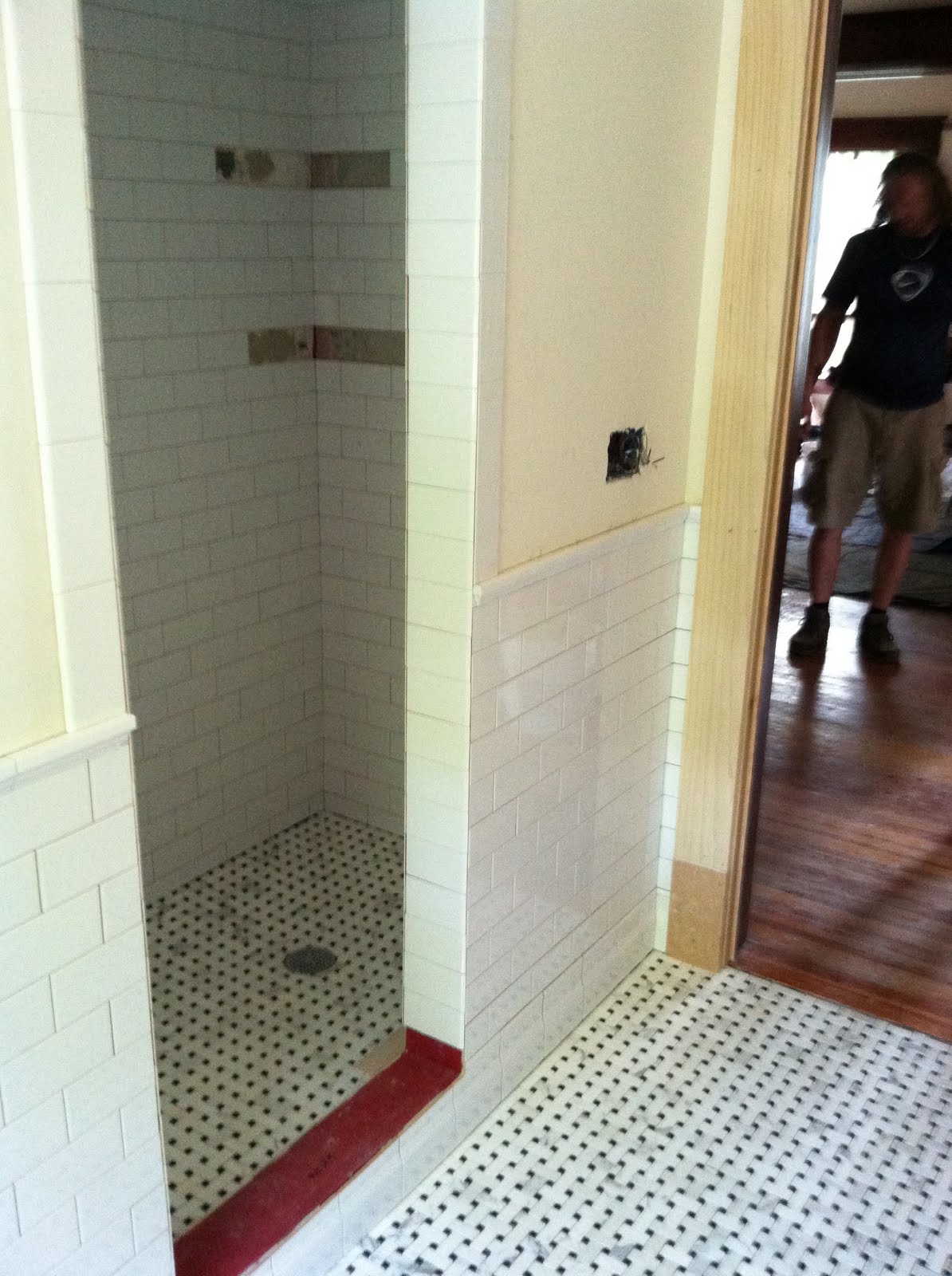 traditional tiles bathroom New Carrara basketweave floor and shower