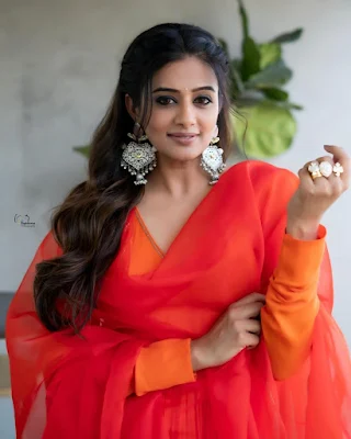 Priyamani smiling and laughing while wearing a casual outfit