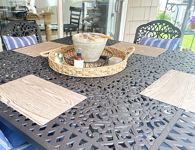 outdoor table with chairs and setting