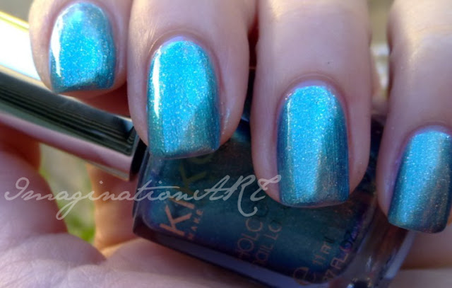 kiko_352_esmerald_nebula_swatch_swatches_smalto_nail_polish_lacquer_unghie_light_impulse