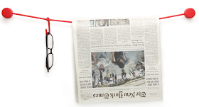 wall-mounted line with hooks - holds eyeglasses, newspaper, etc.