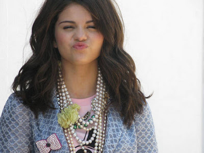 selena gomez falling down makeup. selena gomez hairstyles curly.