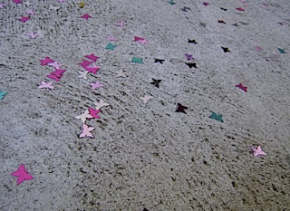 butterfly confetti on the footpath