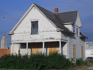 [House moved to make way for urban redevelopment, Lincoln]