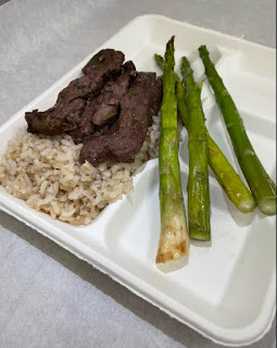 delicious marinated streak tips with asparagus and brown rice