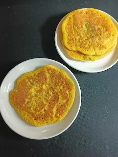 North indian besan chilla served in a plate during breakfast