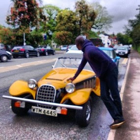 Photo: Chris Attoh Poses With His Fancy Classic Car