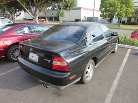 Delaminating paint on Honda Accord.