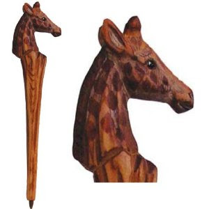 Giraffe head wood carving on top of accessories pens