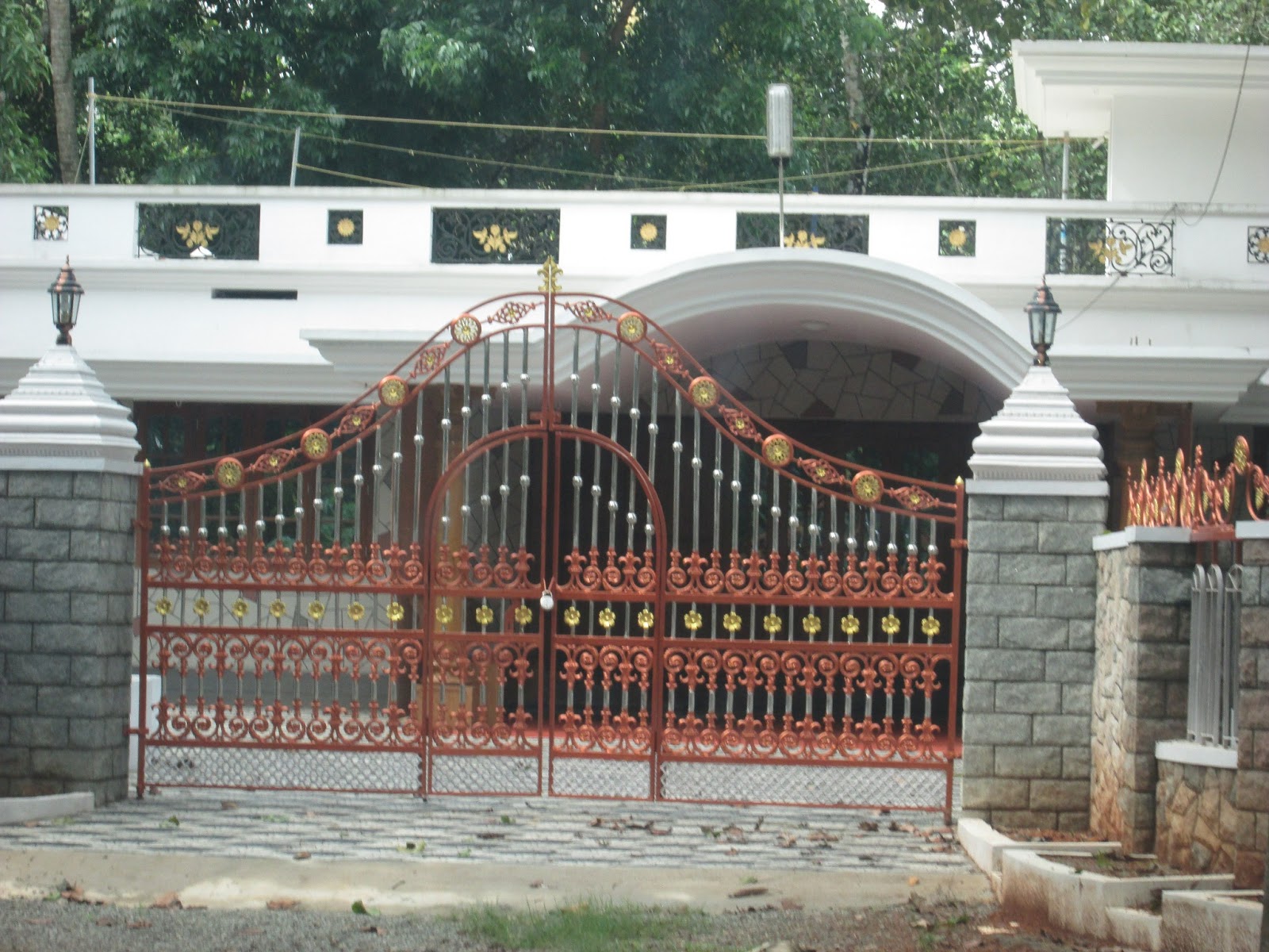 Kerala Gate Designs Kerala house gate with golden and