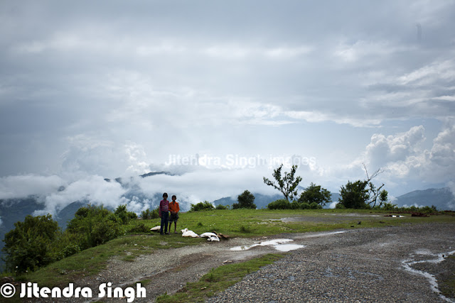 Chakrata is a beautiful & calm hill station in Uttrakhand state of India. Jitendra love such peaceful places to explore and hill stations in this category ranks on top for him. Let's check out this PHOTO JOURNEY through Jitendra's Travelling-Camera.Chakrata is getting more popular as a hill station and people love spending some quality time around these beautiful/fresh hills. Chakrata is basically a cantonment area in Dehradoon district of Uttranchal which quite clean and peaceful. Chakrata town of Uttrakhand can be reached from Dehradun via Mussoorie or Vikasnagar. Both routes pass through beautiful mountainous road. Travelling in the monsoon can be more adventurous as the area sees frequent land-slides, which usually block the roads for longer period of time or at least significantly impact the travel plans.Yamuna valley has amazing panoramic view of the surroundings from the hillock. Chakrata is basically developed by the British rulers and was a summer retreat for the high executives of English East India Company, like other places in Northern India - Shimla, Dalhousie, Masoorie etc. Presently Chakrata encloses military cantonment and the access is restricted here for civilian travelers.The area has an lot of conifers, red rhododendrons and oaks. One of the key attractions near Chakrata is the waterfall named 'Tiger Fall'.Overall local folks are quite helpful and simple. Talking to anyone on the streets around Chakrata is a wonderful experience, where people welcome with broad smiles on their faces. All this makes the travel experience more enjoyable with happy faces all around, who are quite welcoming and helping in natureChakrata is an access-restricted military cantonment and foreigners face severe restrictions in visiting while around this region. It is the permanent garrison of the secretive and elite Special Frontier Force, also known as Establishment 2-2, the only ethnic Tibetan unit of the Indian Army, which was raised after the Indo-China War of 1962.A secluded nearby, leafy hamlet of Deoban offers a panoramic view of the Himalayas stretching from Kinnaur in Himachal to Garhwal and Kumaon. It's almost like Kasauli in Himachal, which has again army regions with very well mmaintained buildings. Chakrata has lusting greeneries with dense forests all around and it's famed as a tourist destination where come to enjoy the natural beauty with calmness and awesome freshness all around. Cool but pleasant ambiance makes the stay in Chakrata more enjoyable. There are various trekking and adventurous activities around Chakrata.Kharamba peak is the highest mount in Chakrata with an altitude of around ten thousand feets. Nature lovers, Trekkers, bird watchers and wild life enthusiasts can spend days together here in the lap of Chakrata exploiting the nature’s hidden treasures and beauties, which sounds most exciting to me and love coming here again n again.This Photo Journey has few shots from Chakarata Market, which is very well equipped with almost every daily usage stuff. Due to cantonement, there are multiple shots. There are some shops, which offer hand-made woolens and can be a good souvenir from hills of Chakarata, Uttrakhand, INDIAChakrata area also has a number of temples including ones at Hanol, Mahasu Devta Temple dedicated to Lord Mahasu , Radina, Thaina, Indroli, Lakhwar, and Lakhamandal, on the banks of river Yamuna, known for its ancient Shiva Temple, which traces its existence to the legends of Mahabharata, the village also has several natural caves.This photograph gives an amazing view of foggy morning at Chakarata. This gives a sense of awesome weather on hills of Chakarata. While in hills, this fog excites you more as compared to plains. Also it adds a lot of value to your travel in hills, which real feel of mountains.The forests & hills around Chakrata has an amazing flora and fauna, along with innocent kids with always smiling faces and ready to get clicked. These hills are natural habitat of many wild life species including panther, spotted dear and wild fowls. 