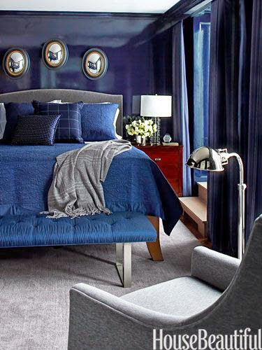 blue and white bedroom with lacquer walls