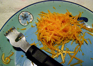 Orange Zest with Zesting Tool on Plate
