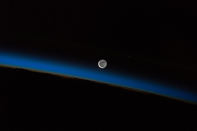 Moon and Earth's Atmosphere seen from International Space Station