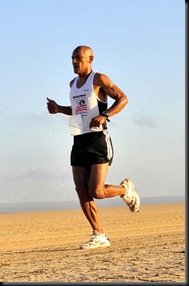 091216-N-9187B-007 GRAND BARA, Djibouti (Dec. 15, 2009) Army National Guard Sgt. Rafael Rivas approaches a water-station during a 15K run through the Grand Bara Desert, Djibouti.  Sgt. Rivas, 55, placed second overall in his age bracket finishing in just under 58 minutes.  Hosted by the French Foreign Legion, the 27th Grand Bara Run included runners from American, Japanese, French, and local Djiboutian militaries.  Photo by Mass Communication Specialist 2nd Class Joshua Bryce Bruns.