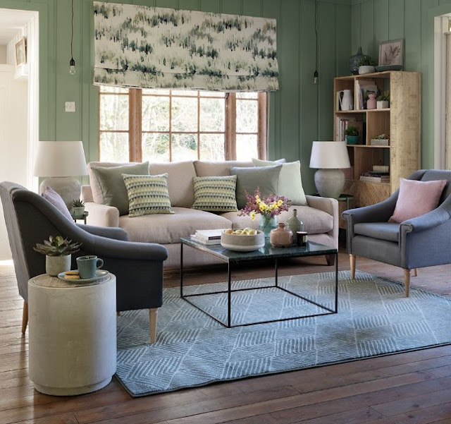 sage green and blue living room