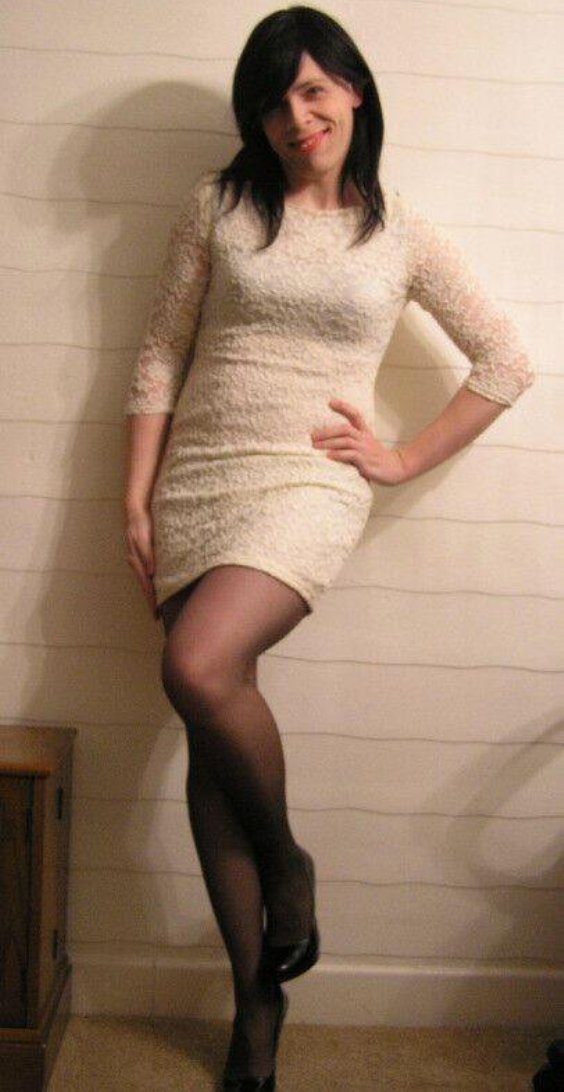 Lovely crossdresser in pantyhose and high heels