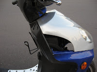 Plastic sidepanel, where the headlights are