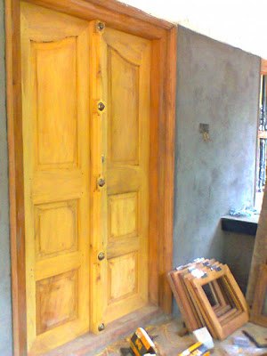kerala style Carpenter works and designs: Main Entrance 