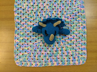 another view of the cute The Triceratops Dino Baby Lovey