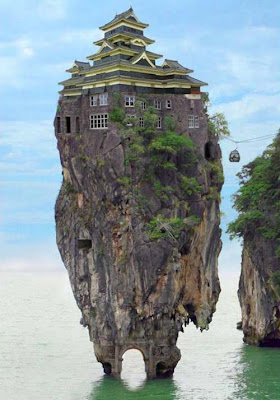 picture of a house on a rock